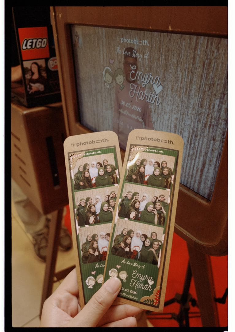 Custom-designed wedding photostrip with the couple's names